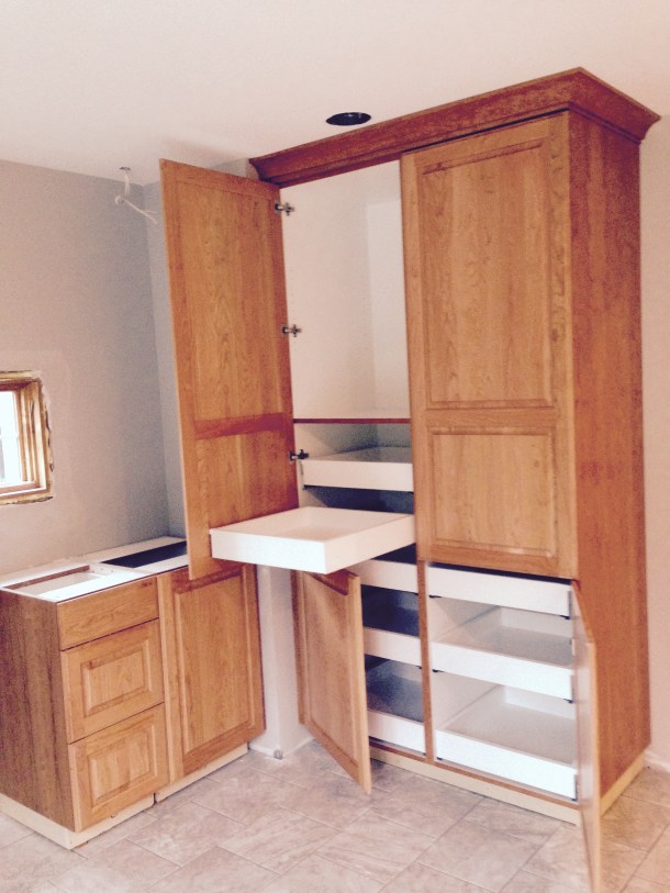 Lots of drawers! Notice the pretty crown molding.