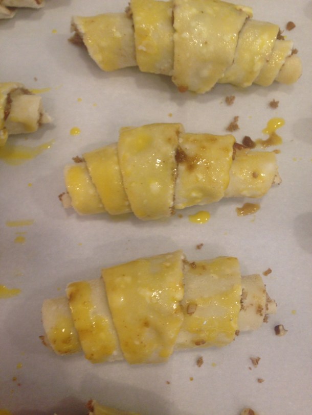 Brush Rugelach with egg yolk wash